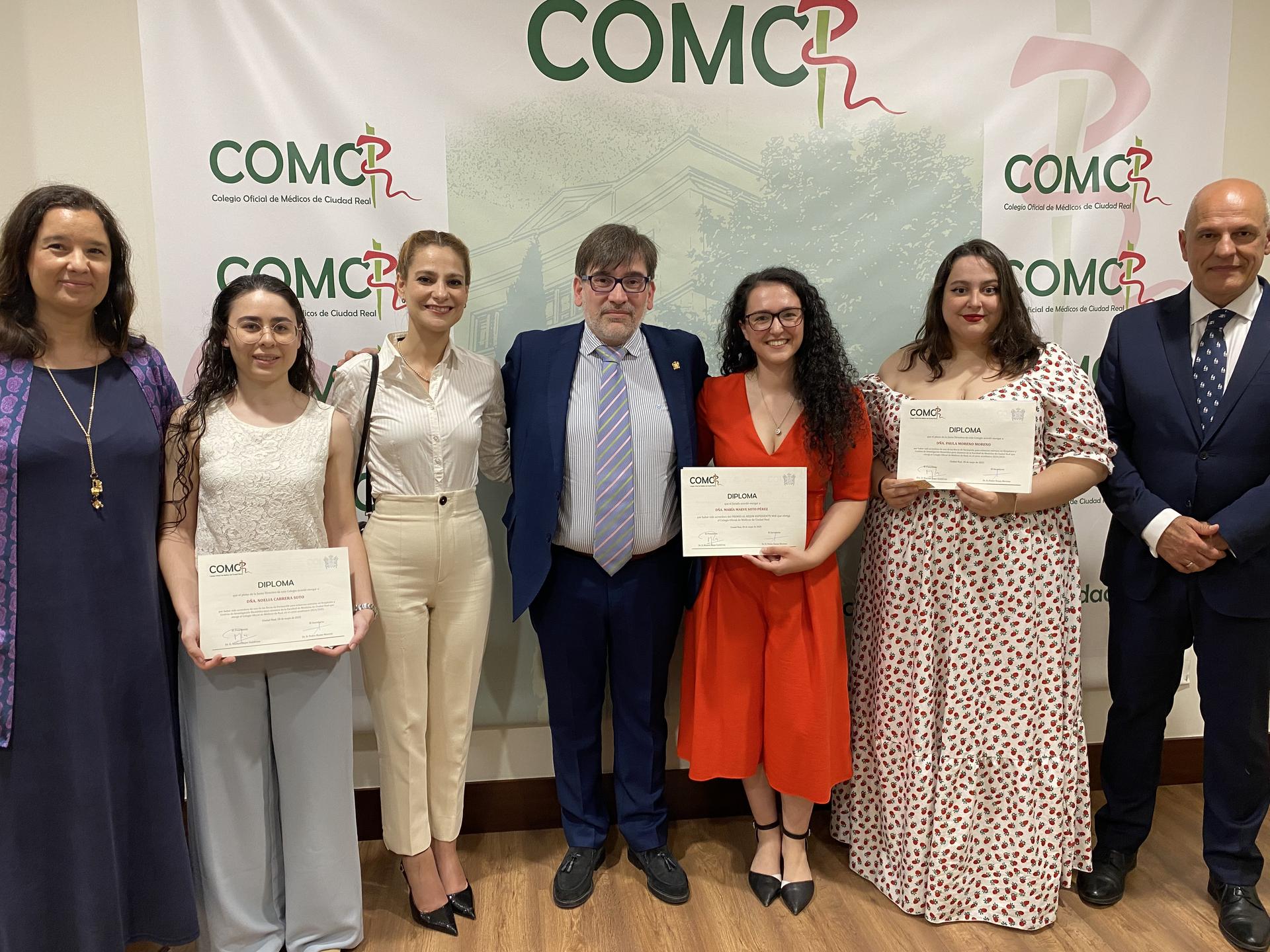 Masks hanging on a clothes line.